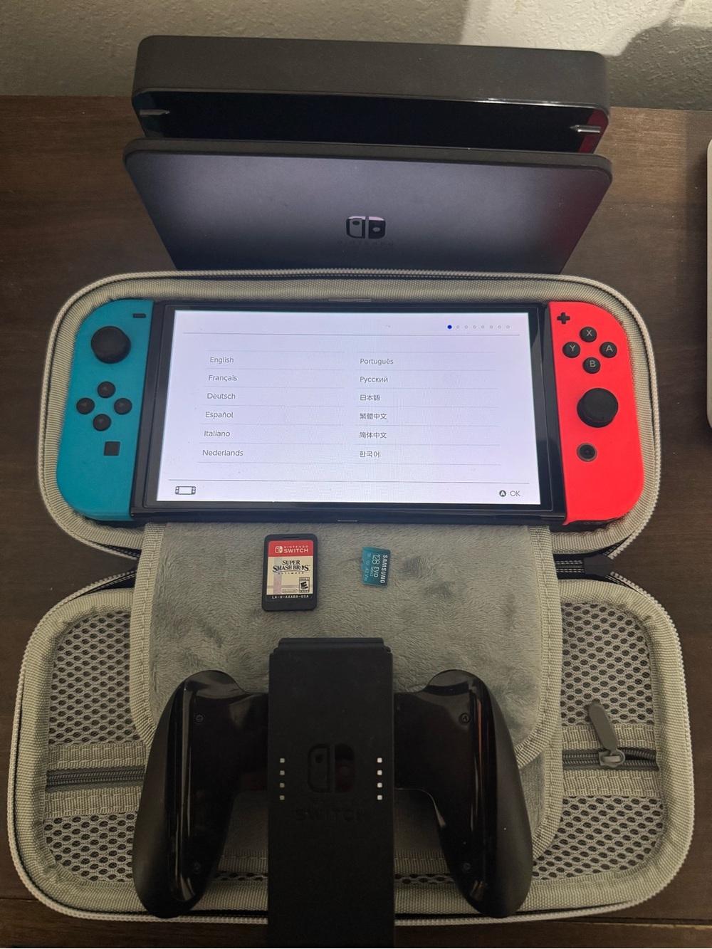 Nintendo Switch Oled with smash bros ultimate,SIM card and carrying case
